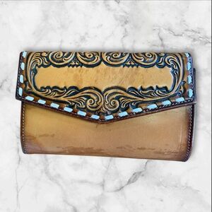 Leather billfold with check and pen spot